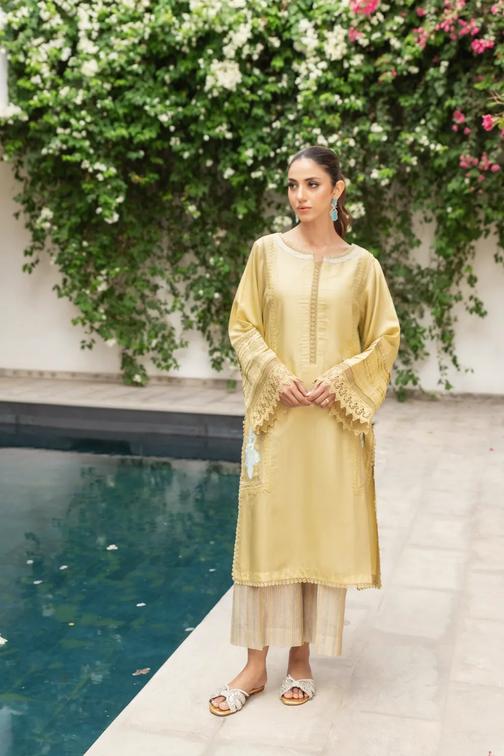 Aftab in gold, full length