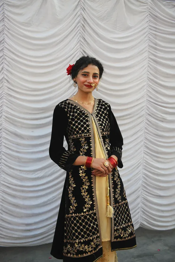 Jugnu in black and gold