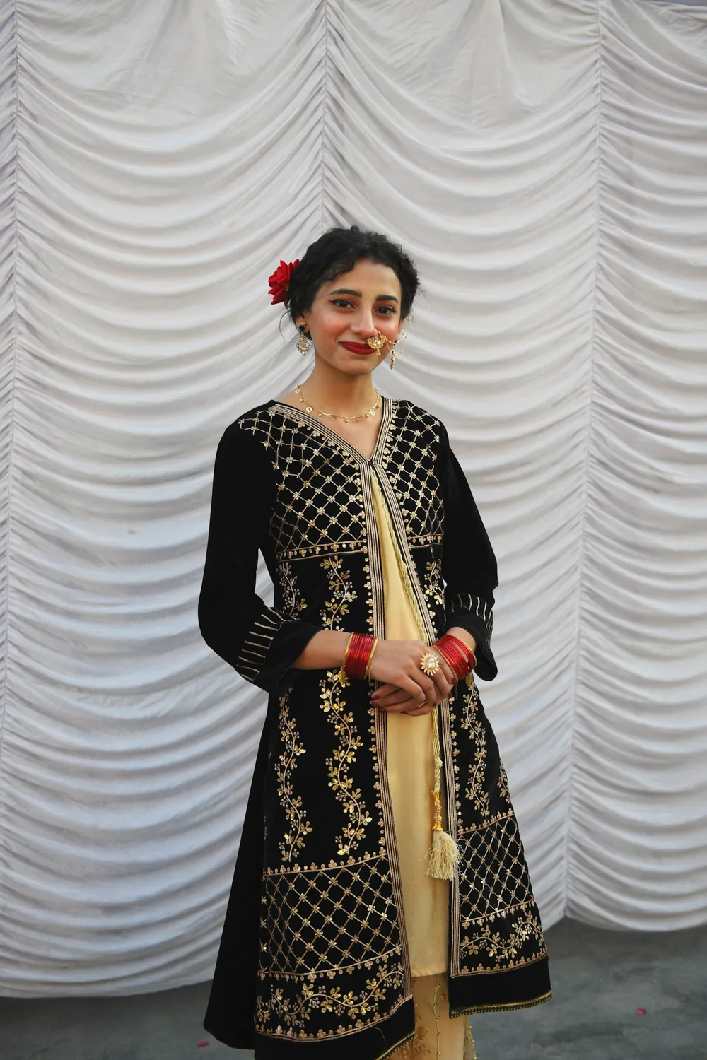 Jugnu in black and gold, full length